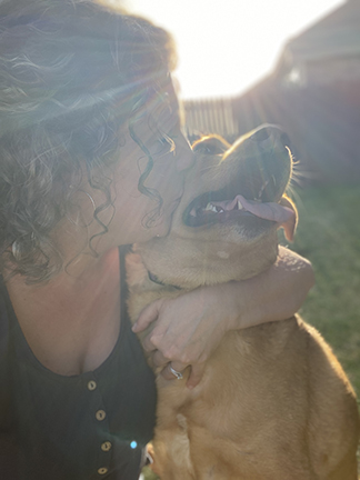 Adoptive couple with a sweet dog