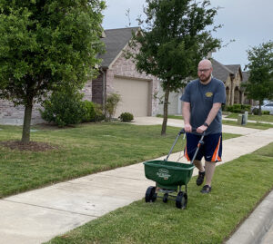 Adoptive father doing yard work