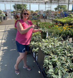 Adoptive mom likes gardening